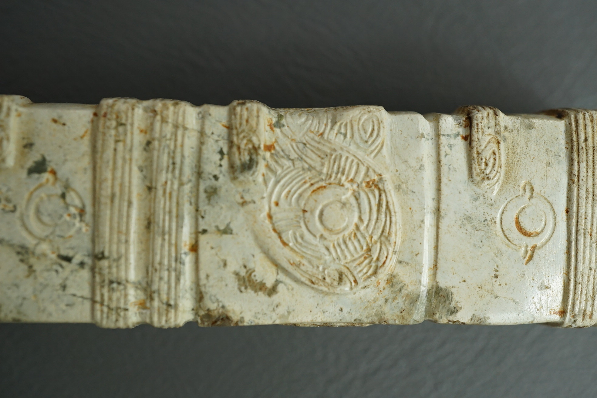 Four Chinese archaistic hardstone or burnt jade cong or cylinders